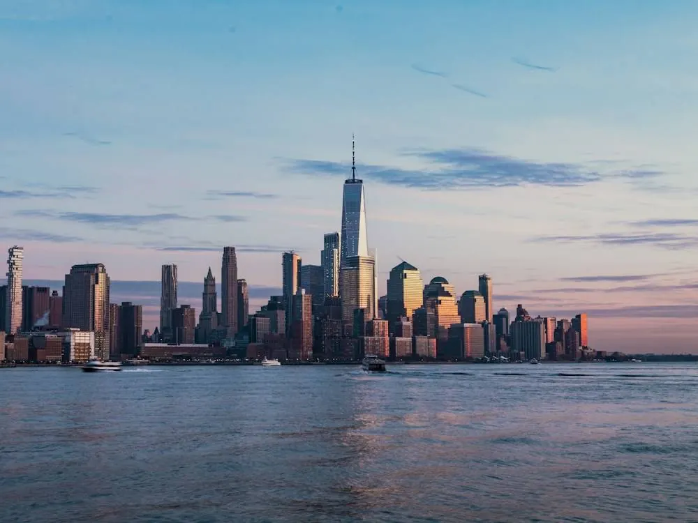 New York City skyline across the river at dusk