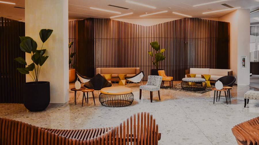 Modern hotel lobby with lounge seating