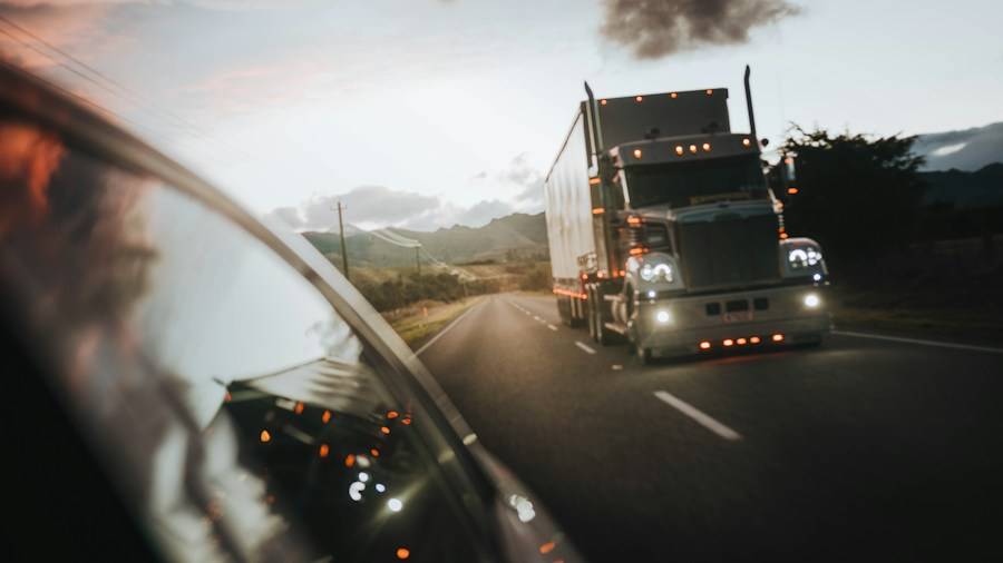 Semi truck on a highway at dusk
