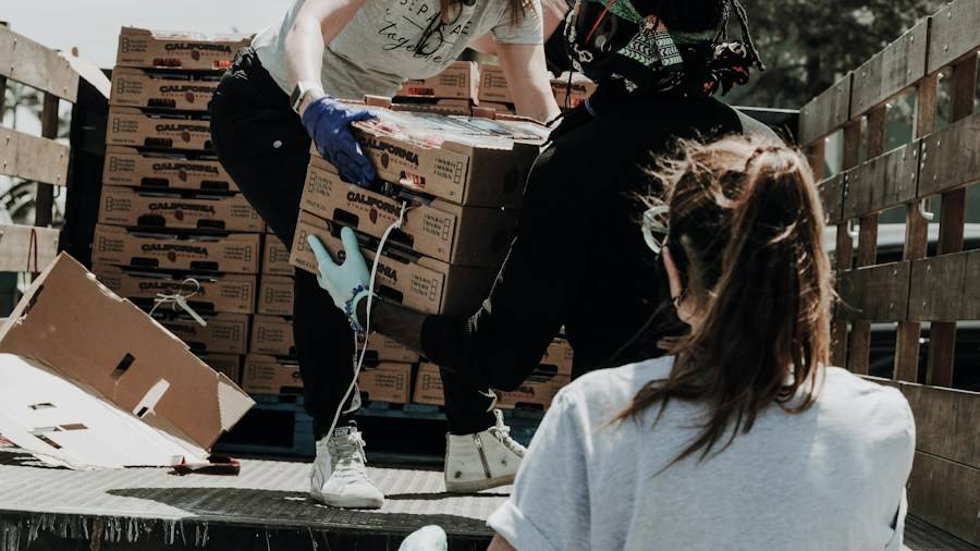 Volunteers loading boxes of supplies