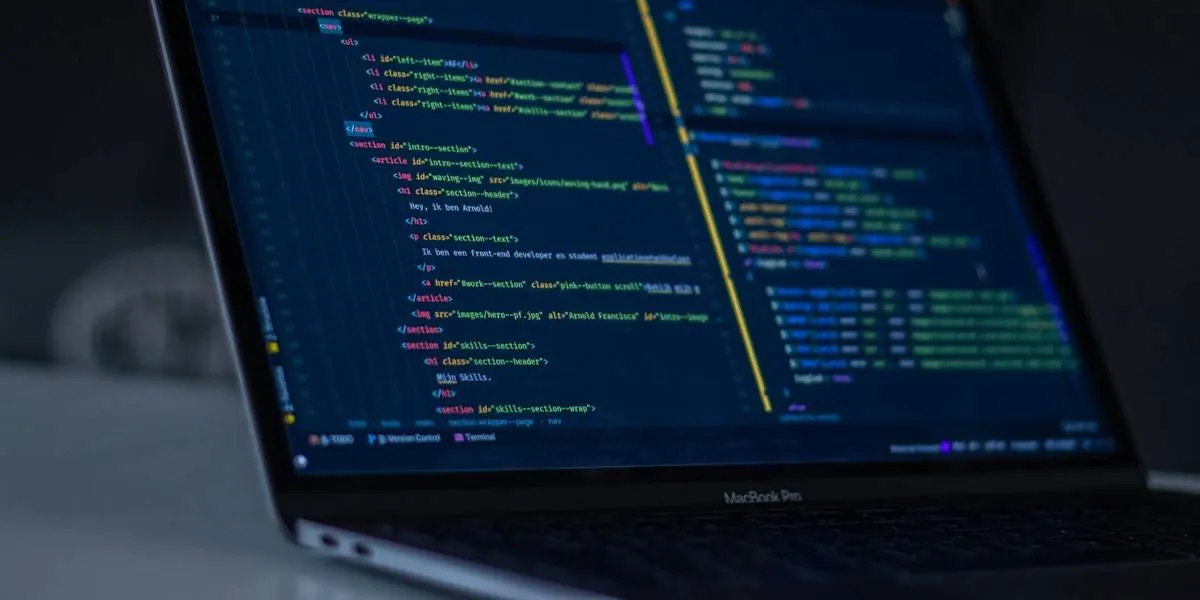 Laptop screen showing source code